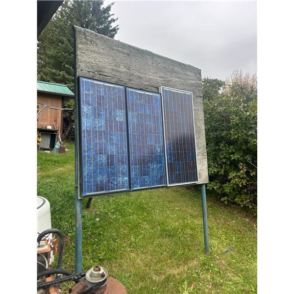 3 solar panels on stand