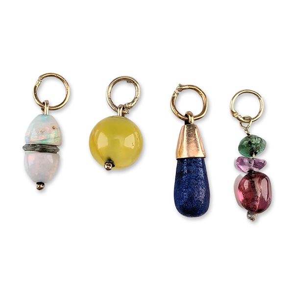 Group of Four Gemstone and 8K, 10K, and 12K Gold Charms