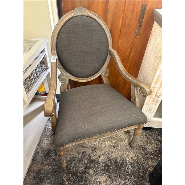 Ornate Carved Black Cloth Padded Armchair