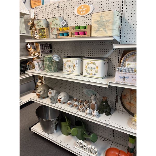 Citronella Candles, Watering Cans, Animal Décor, More on Shelves