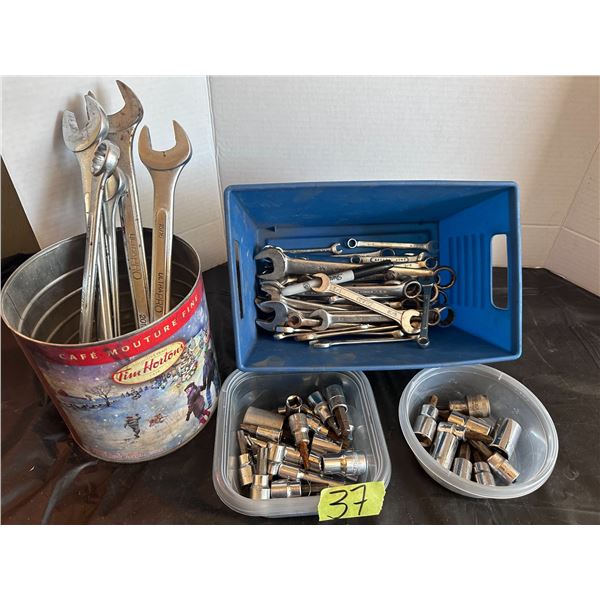 Combination wrenches and sockets
