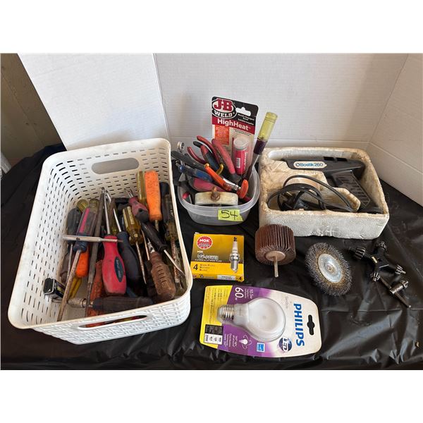 Bins full of hand tools including pliers, screw drivers and more