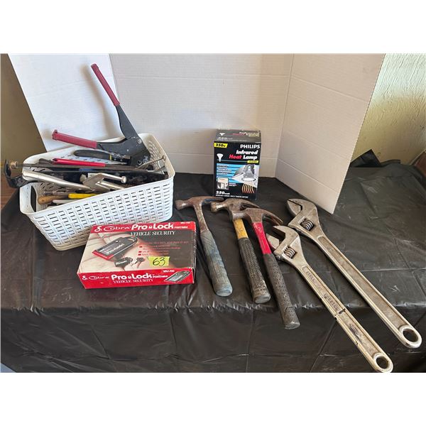 Hammers, adjustable wrenches and bin of other assorted hand tools