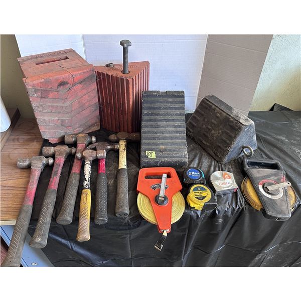 Hammers, measuring tapes, wheel blocks and more