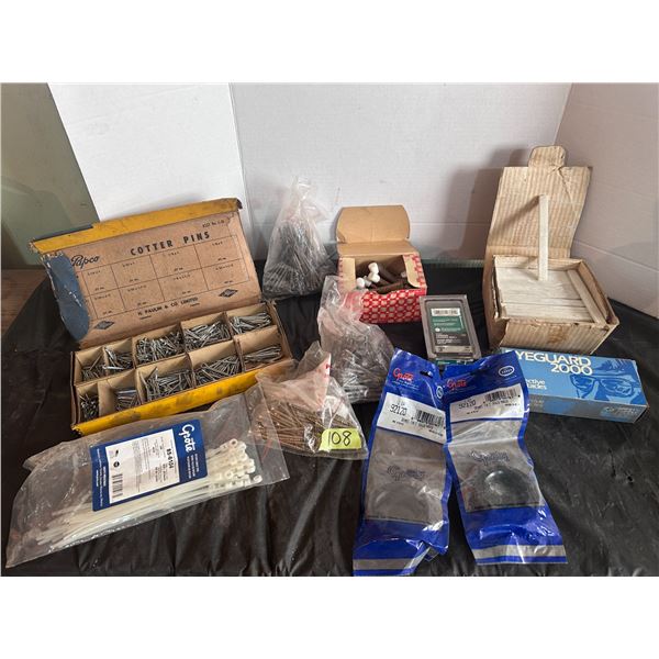 Assortment of cotter pins, screws, cable ties and more