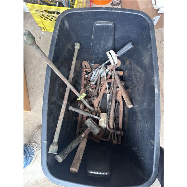 Container with hand tools and assorted parts