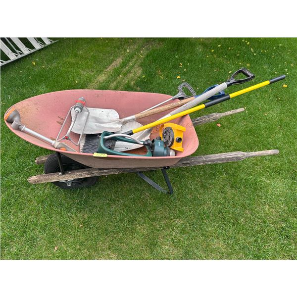 Assorted garden tools including wheel barrow and more