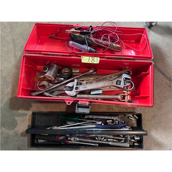 Large metal tool box filled with assorted hand tools