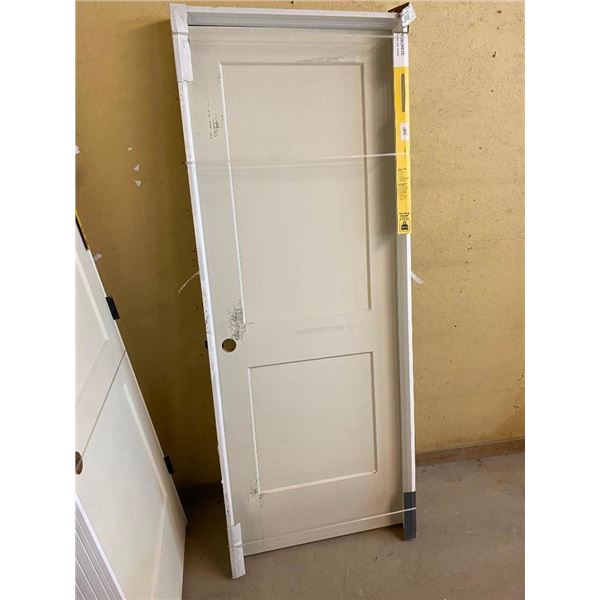 30IN INTERIOR DOOR - HAS SOME SCRATCHES AND DINGS AND SMALL CRACK IN FRAME