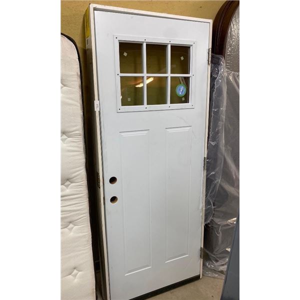 32IN EXTERIOR DOOR - HAS SOME SCRATCHES AND DING ON BOTTOM CORNER OF DOOR