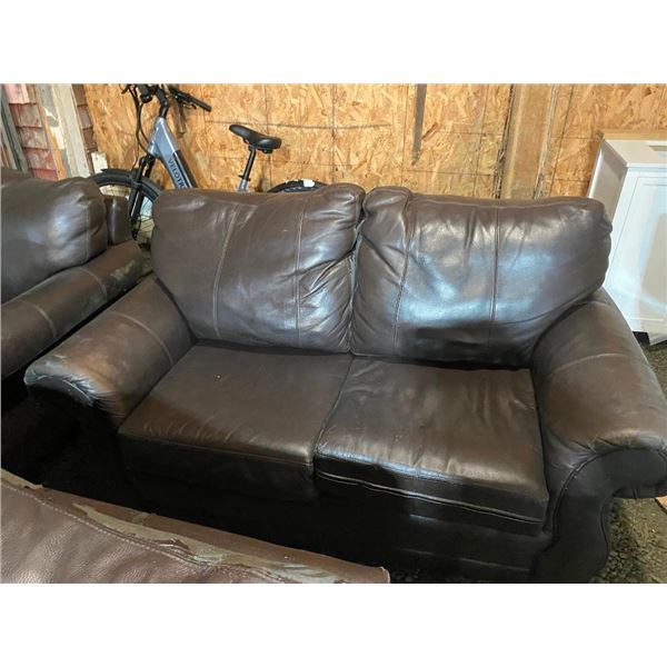 64IN LEATHER LOVE SEAT - USED - HAS SOME LEATHER GONE
