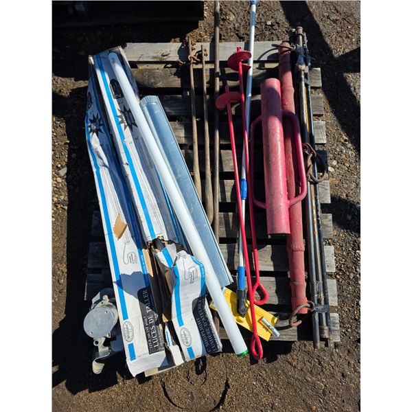 Pallet of Misc. Items – Tie Down Poles, 4’ Shop Lights, etc.