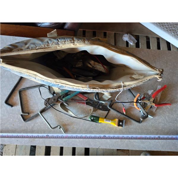 Insulated bag full of tools and hardware