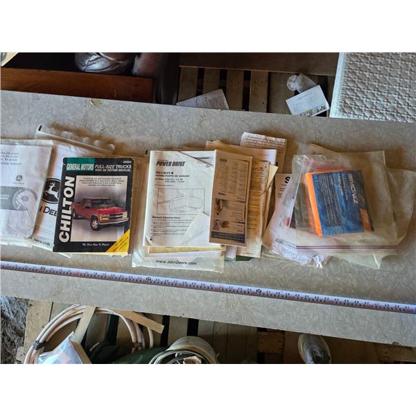 Various manuals, power tools, trailers, vehicles