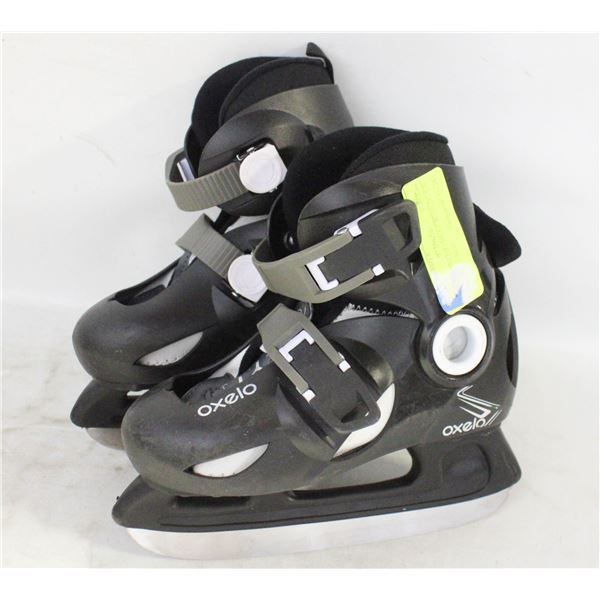 OXELO CHILDRENS SZ 9C/10.5C ICE SKATES - USED
