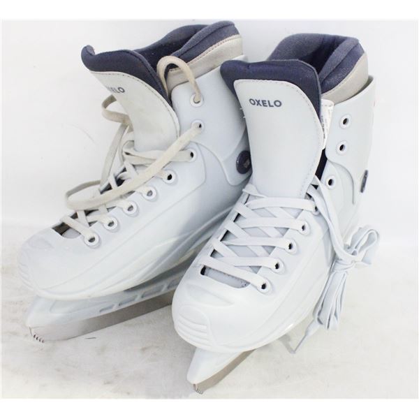 OXELO LADIES SZ 7.5 ICE SKATES - USED