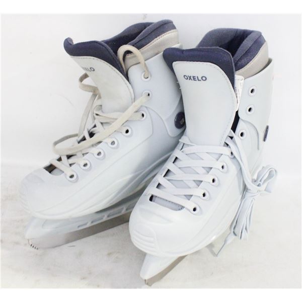 OXELO LADIES SZ 7.5 ICE SKATES - USED