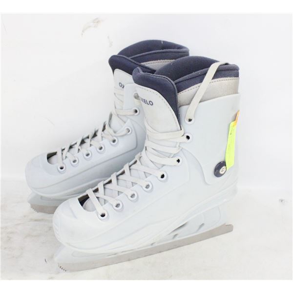 OXELO LADIES SZ 7.5 ICE SKATES - USED