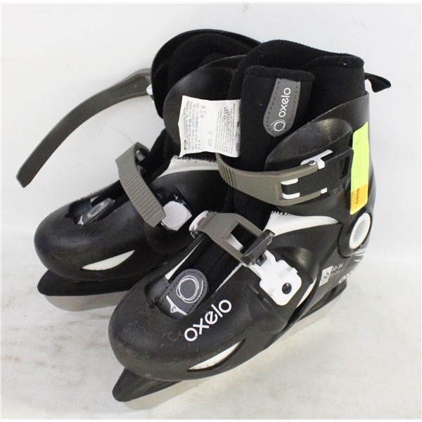 OXELO KIDS SZ 1/2.5 ICE SKATES - USED