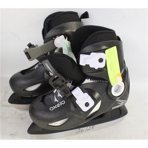 OXELO CHILDRENS SZ 9C/10.5C ICE SKATES - USED