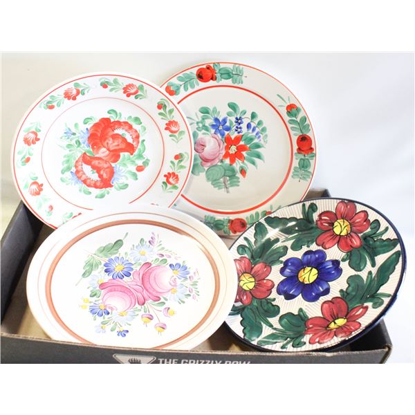 FOUR COURFUL EUROPEAN PLATES