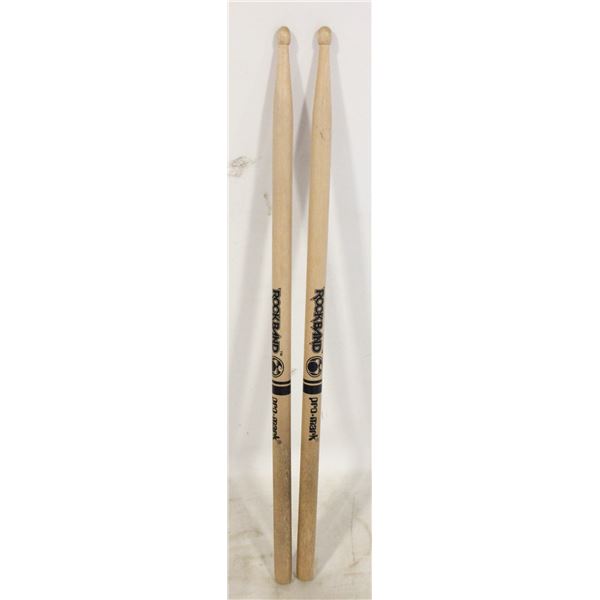 LOT OF TWO ROCKBAND DRUM STICKS