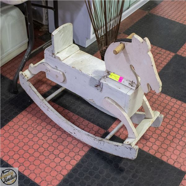 ANTIQUE SOLID WOOD ROCKING HORSE