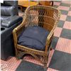 Image 1 : WICKER CHAIR ARMREST WITH CUSHION