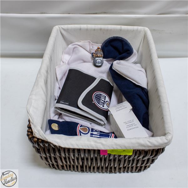 LOT WITH OILERS WEARBLE BLANKET AND CD CASE IN