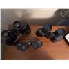 Image 2 : Three Binoculars: Bushnell, Hensoldt, and Nashica