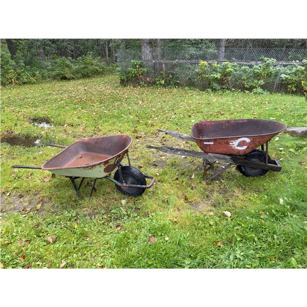 Rusted Metal Garden Wheelbarrows