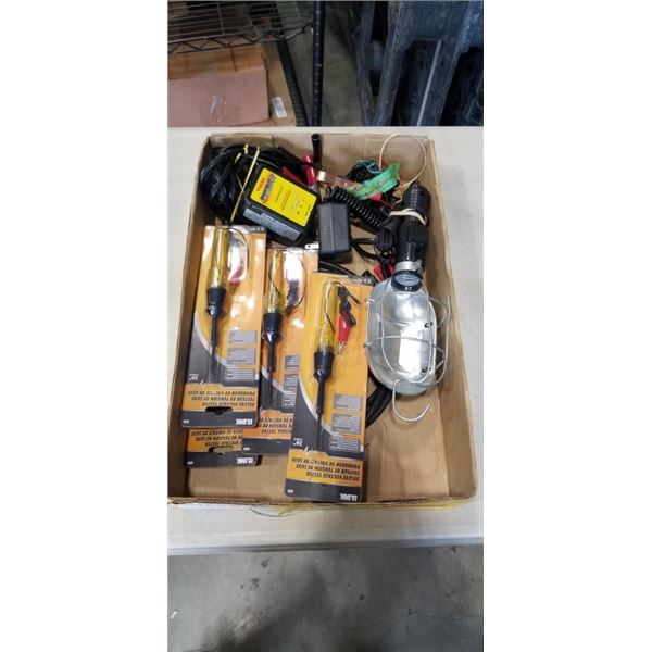 TRAY OF NEW VOLTAGE TESTERS AND WORKLIGHT AND YUASA SMARTSHOT 900 BETTERY CHARGER