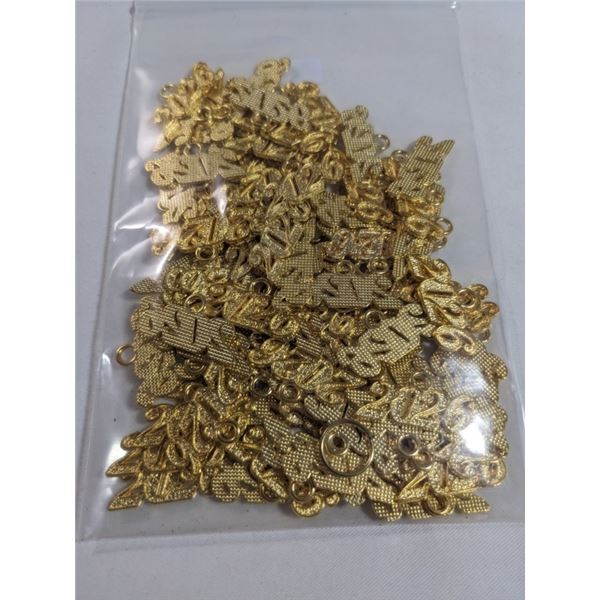 BAG OF 2026 PENDANTS, GOLD PLATED 130 GR