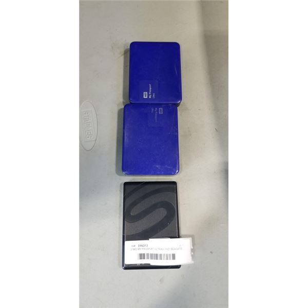 2 WD MY PASSPORT ULTRAS AND SEAGATE BACKUP PLUS PORTABLE DRIVE