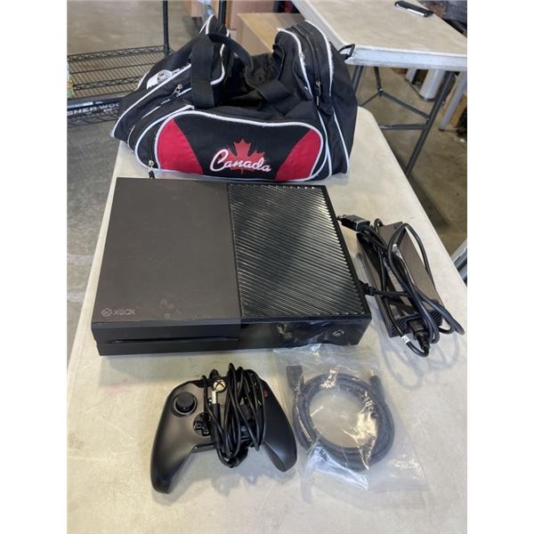 XBOX ONE WITH CONTROLLER AND POWER SUPPLY. COMES WITH HOCKEY CANADA BAG