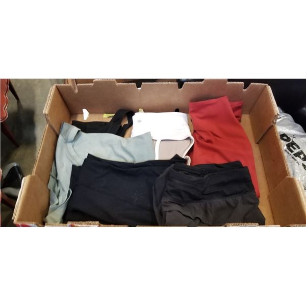 TRAY OF LULULEMON CLOTHES