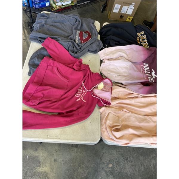 5 HOODIES. HOLLISTER XL, SHADOW L, ETHENA L, PUMA XL, CHAMPION XL.