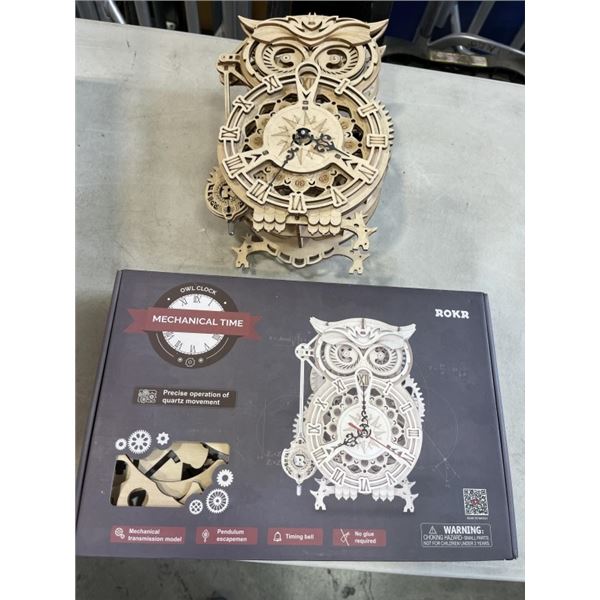 TWO MECHANICAL OWL CLOCKS