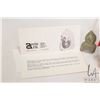 Image 5 : Anne Weetaluktuk hand made mother and child doll with craved green soapstone heads, 12" in height. I