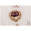 Image 3 : Three antique brooches including tested 14kt yellow gold set with peridot like green gemstones, and 