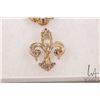 Image 4 : Three antique brooches including tested 14kt yellow gold set with peridot like green gemstones, and 