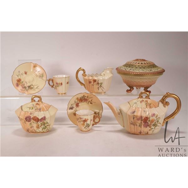 Antique Royal Worcester hand-painted tea service including teapot, cream and lidded sugar, marked 11