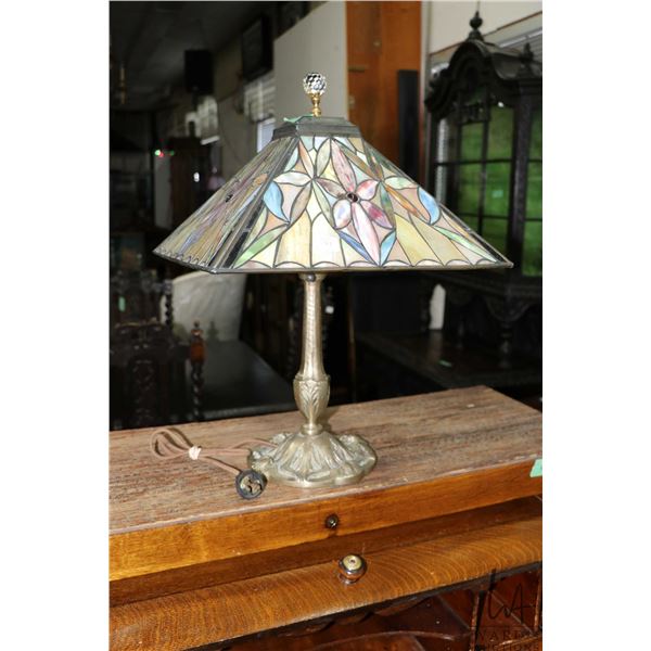 Vintage bronze lamp base with pyramid style floral motif shade, 21" in height