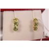 Image 3 : 14kt yellow gold and peridot gemstone bracelet, size 7" and a pair of 14kt yellow gold and peridot e