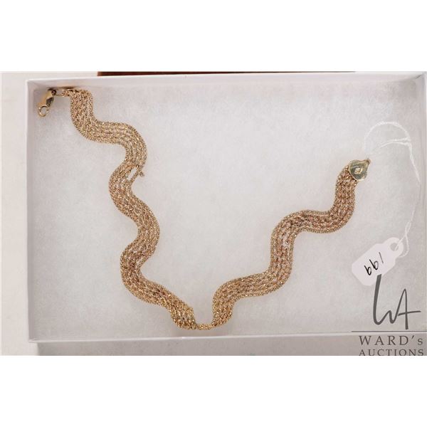 10kt yellow gold woven bracelet, note: needs repair