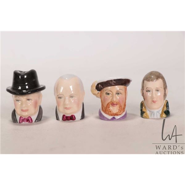 Four Staffordshire collectible porcelain thimbles including two Winston Churchill, one Robbie Burns 