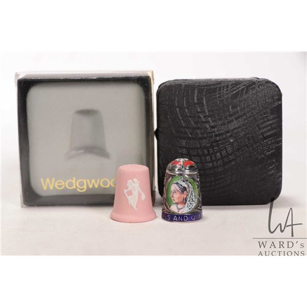 Two collectible thimbles including sterling silver and enamel "Queen Victoria" with British hallmark