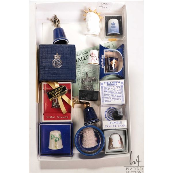 Selection of collectible thimbles including Royal Worcester, Royal Copenhagen, Limoges, Dresden like