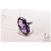 Image 1 : 14kt white gold ring set with large oval cut purple sapphire like gemstone, size 5.75
