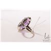 Image 2 : 14kt white gold ring set with large oval cut purple sapphire like gemstone, size 5.75